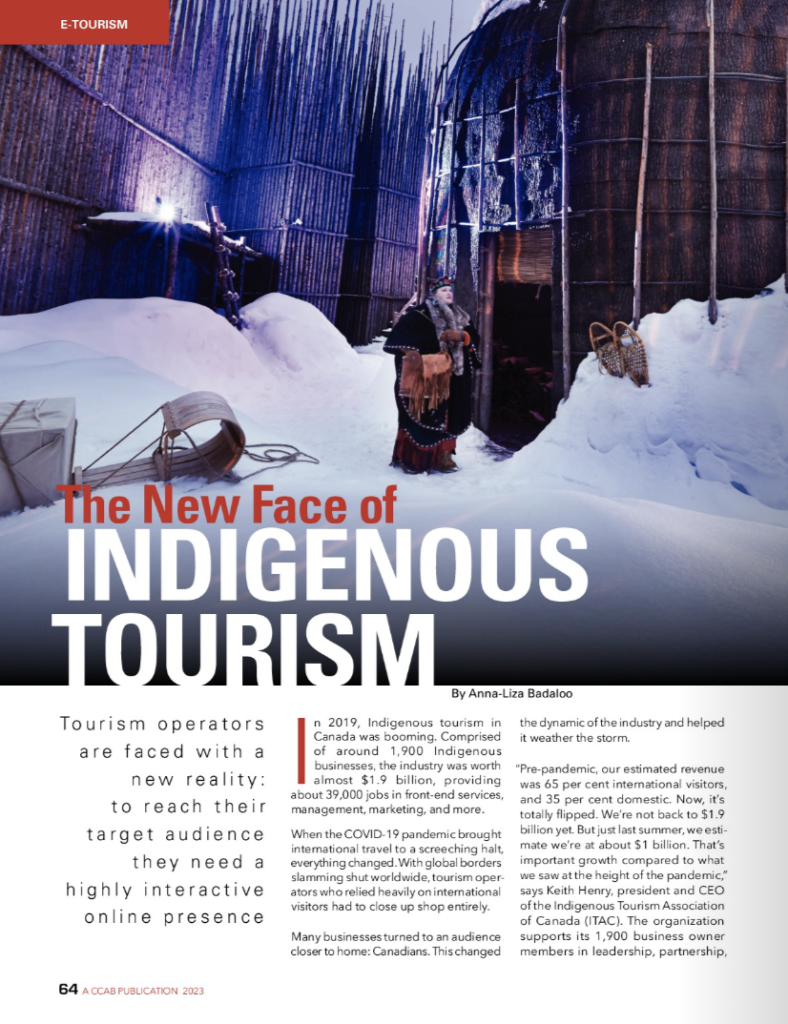 Photo of the magazine page featuring Anna-Liza's article. The images shows a snowy Northern scene, featuring a snowsled and an Indigenous person. The title of the article reads "The New Face of Indigenous Tourism"